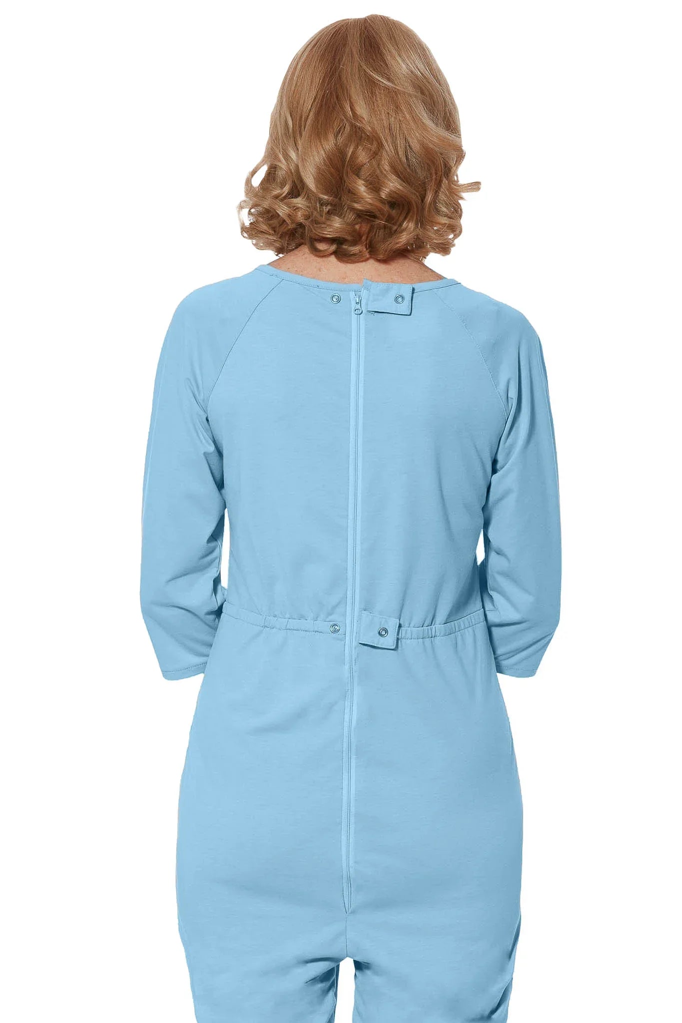 Back view of Ovidis adaptive blue jumpsuit for women with rear zipper and snap closures