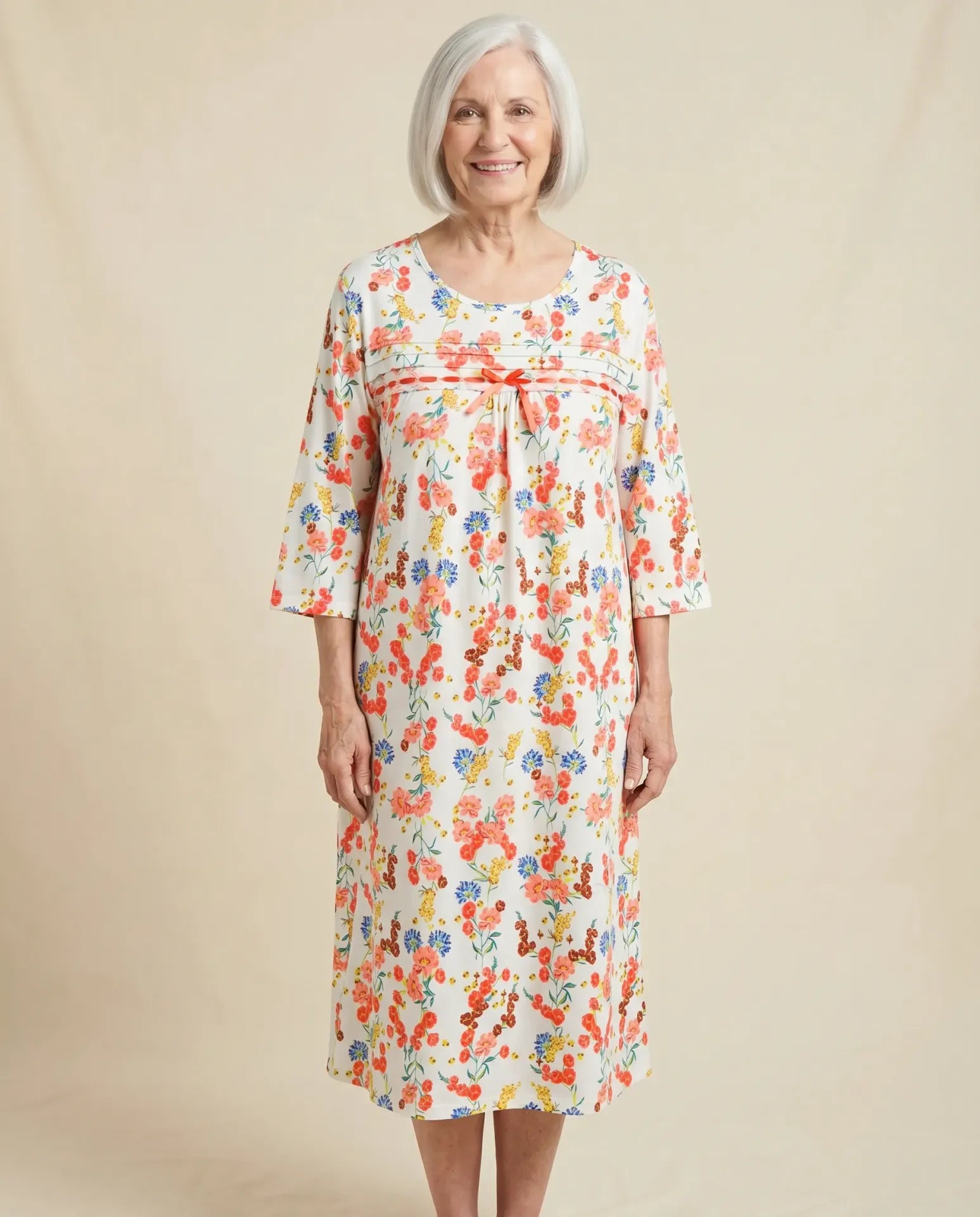 Olivia Nightgown - Coral, modeled by senior woman, front view