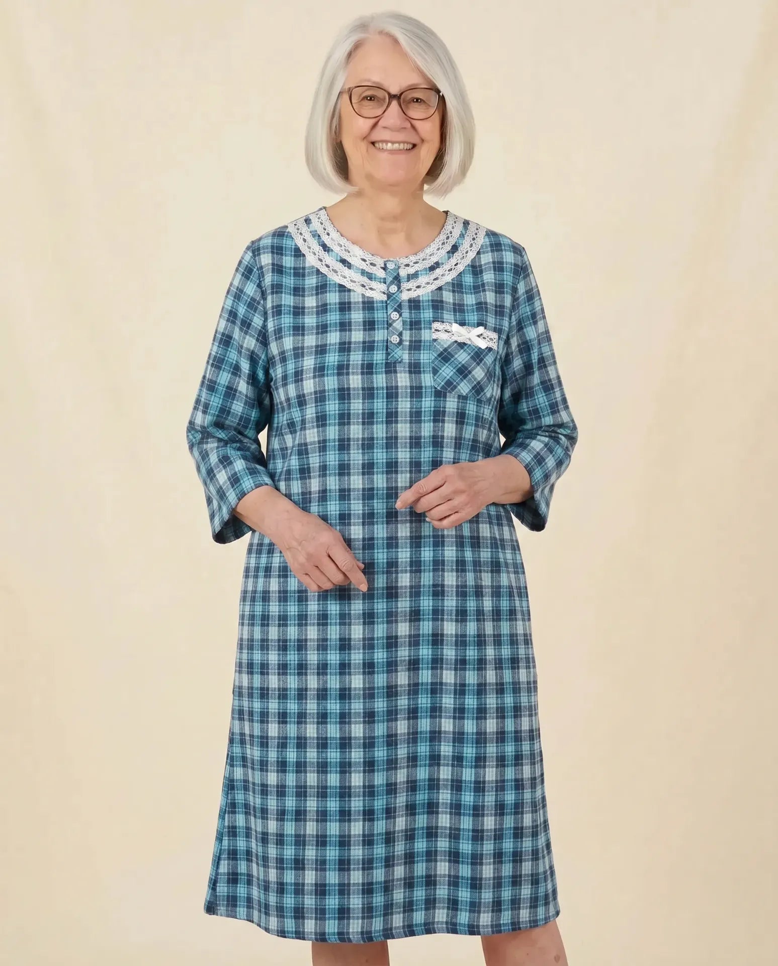 Mandy Nightgown - Turquoise, senior woman front view, parchment backdrop