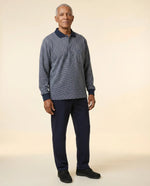 Senior man wearing Ovidis adaptive Lucas Eclipse jacquard polo shirt, easy assisted dressing for seniors