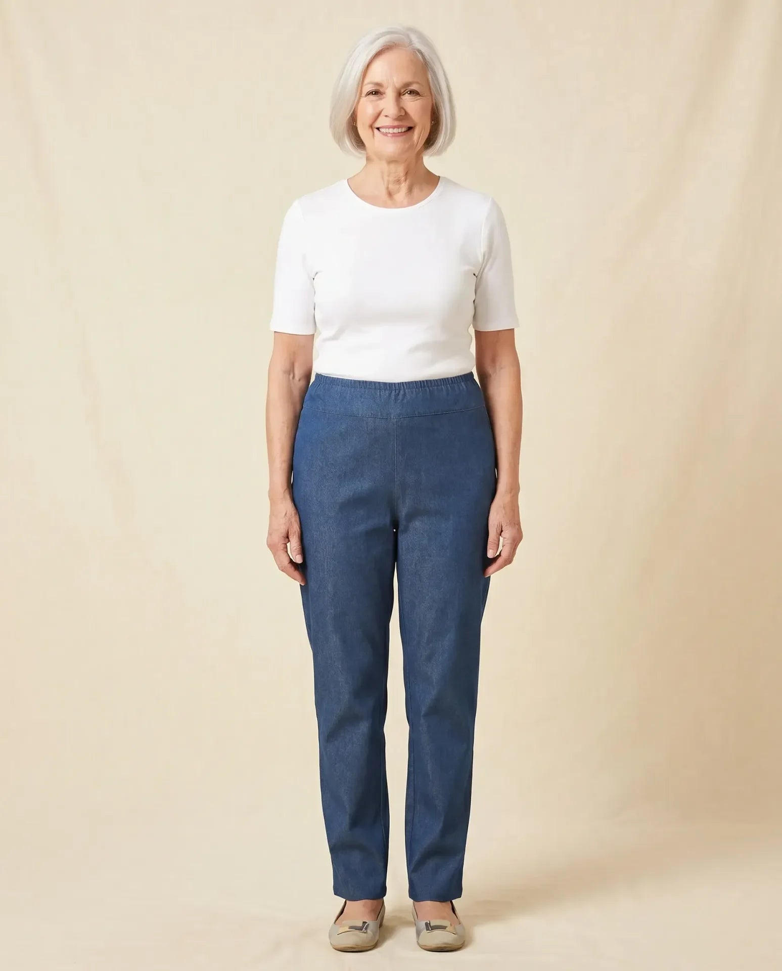 Senior woman wearing Ovidis Tricotti Jeans in Denim, full body front view