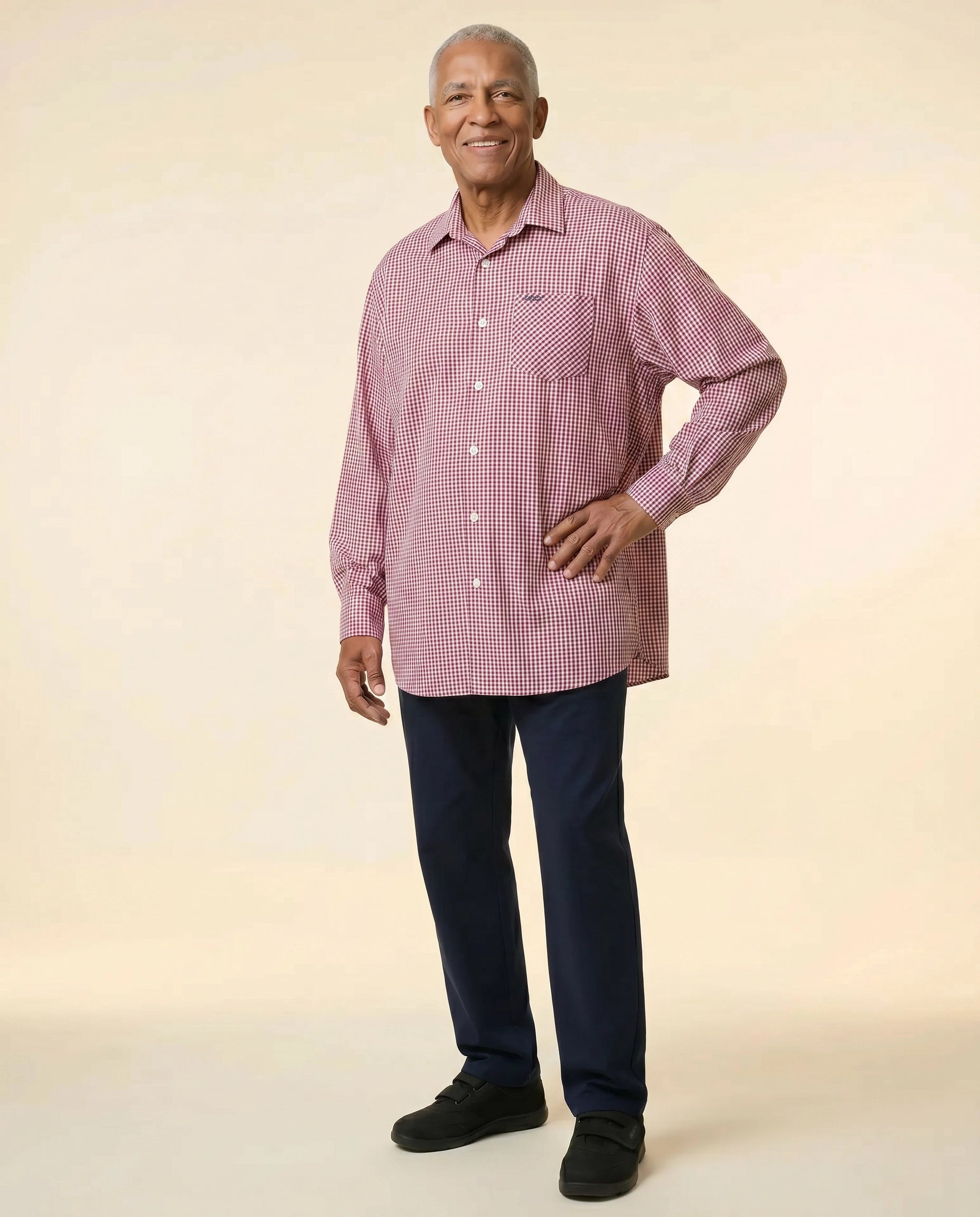 Senior man wearing Ovidis adaptive Brian Wine gingham shirt, loose relaxed fit, easy assisted dressing for seniors