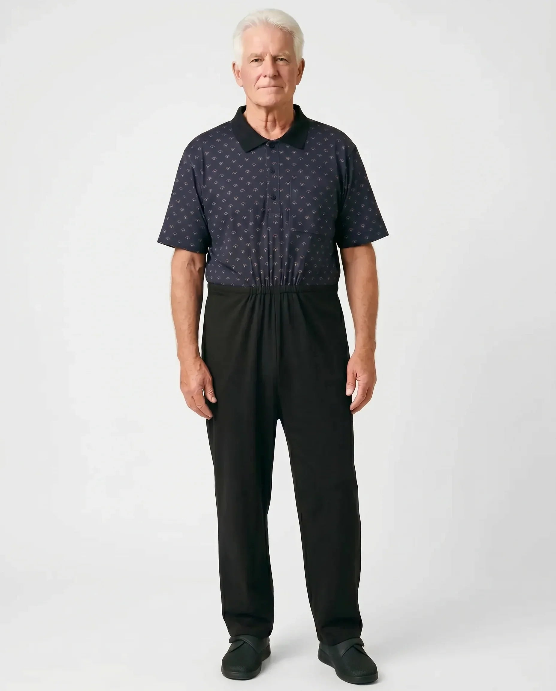 Senior man wearing Charly Copper adaptive jumpsuit, full body front view