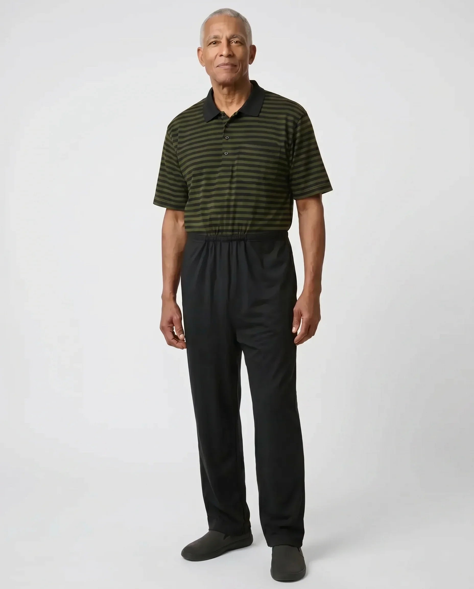 Senior man wearing Charly Khaki adaptive jumpsuit, full body front view