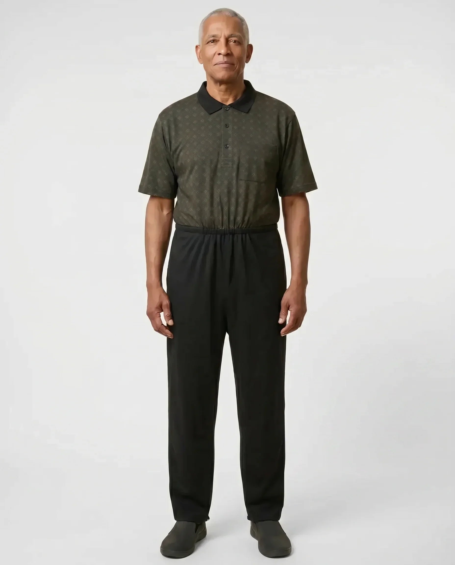 Senior man wearing Charly Trellis adaptive jumpsuit, full body front view
