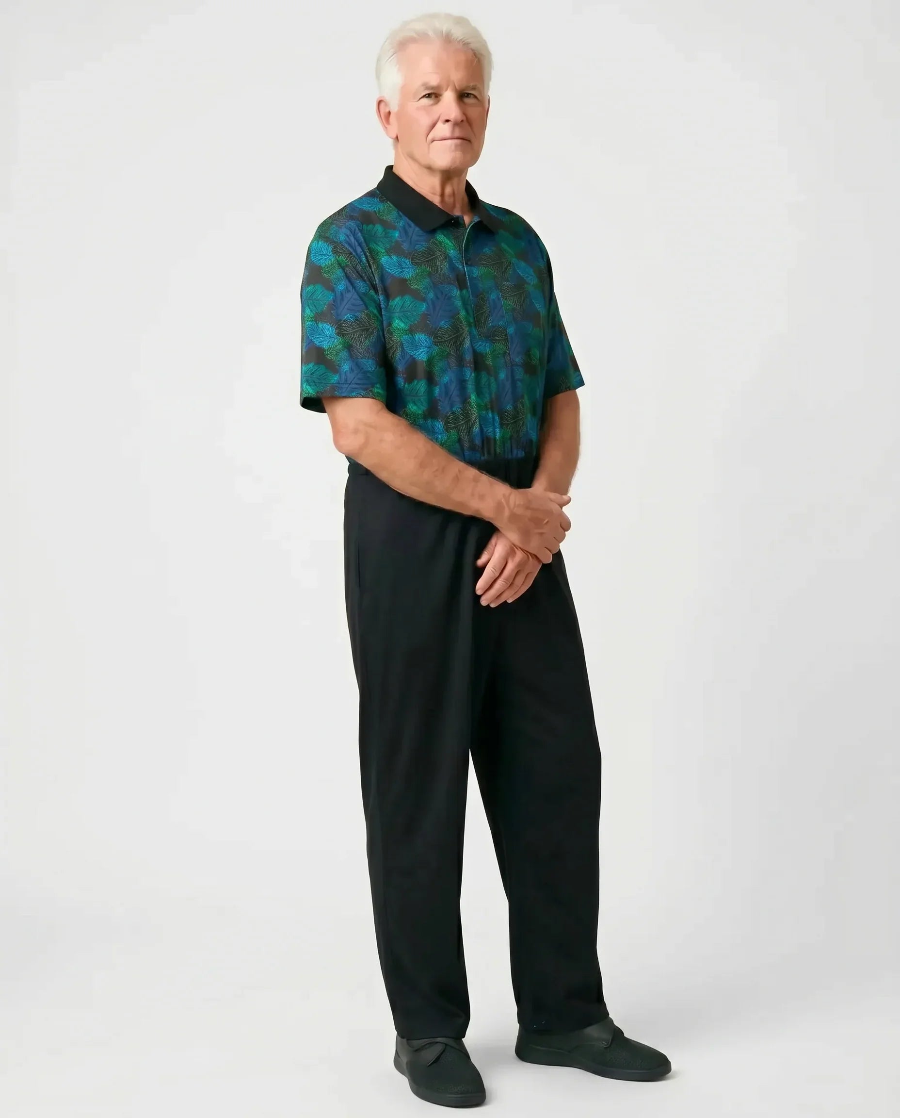 Senior man wearing Charly Tropical adaptive jumpsuit, full body front view