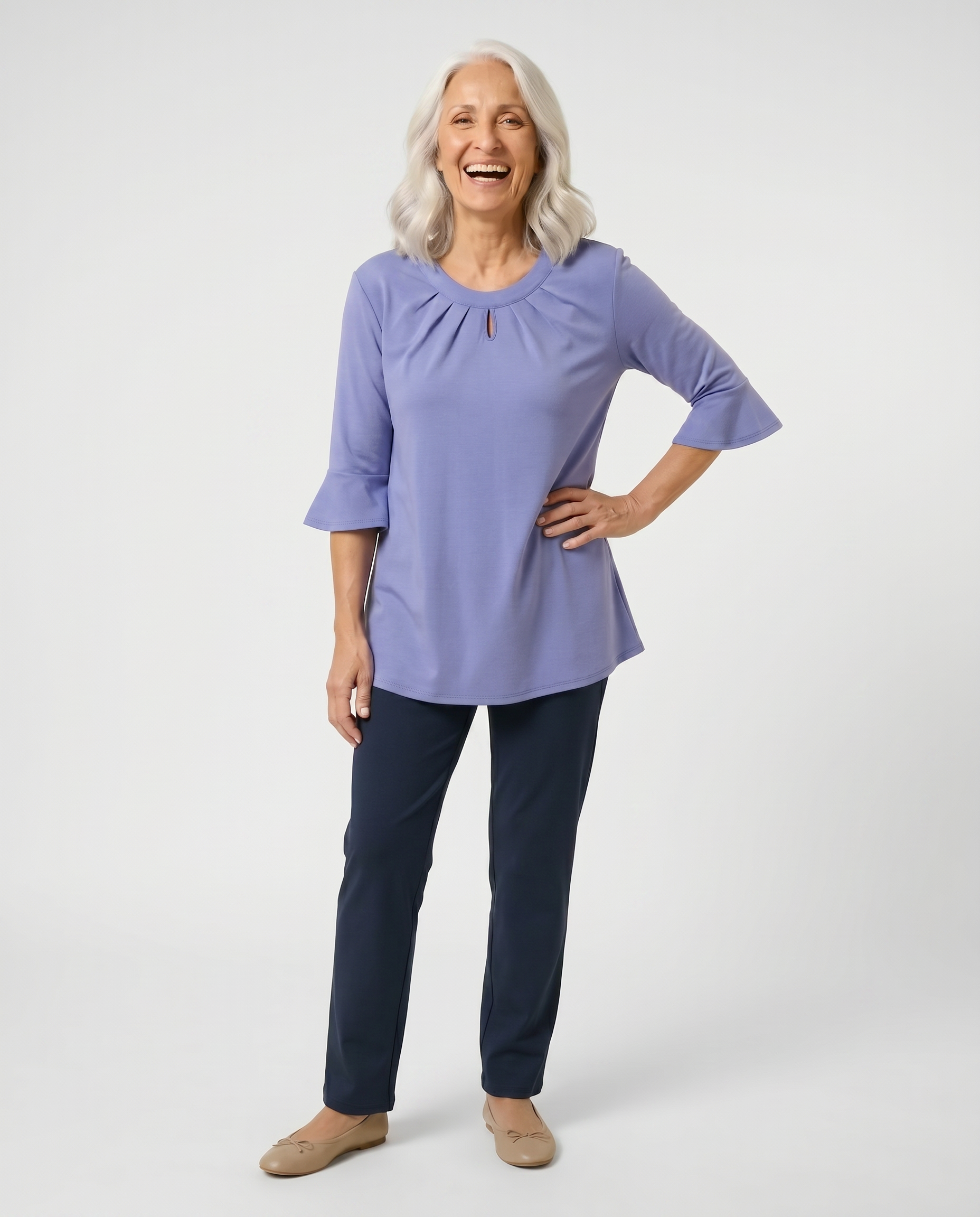 Senior woman wearing Ovidis adaptive lavender Cristy top with bell sleeves and keyhole neckline, easy dressing