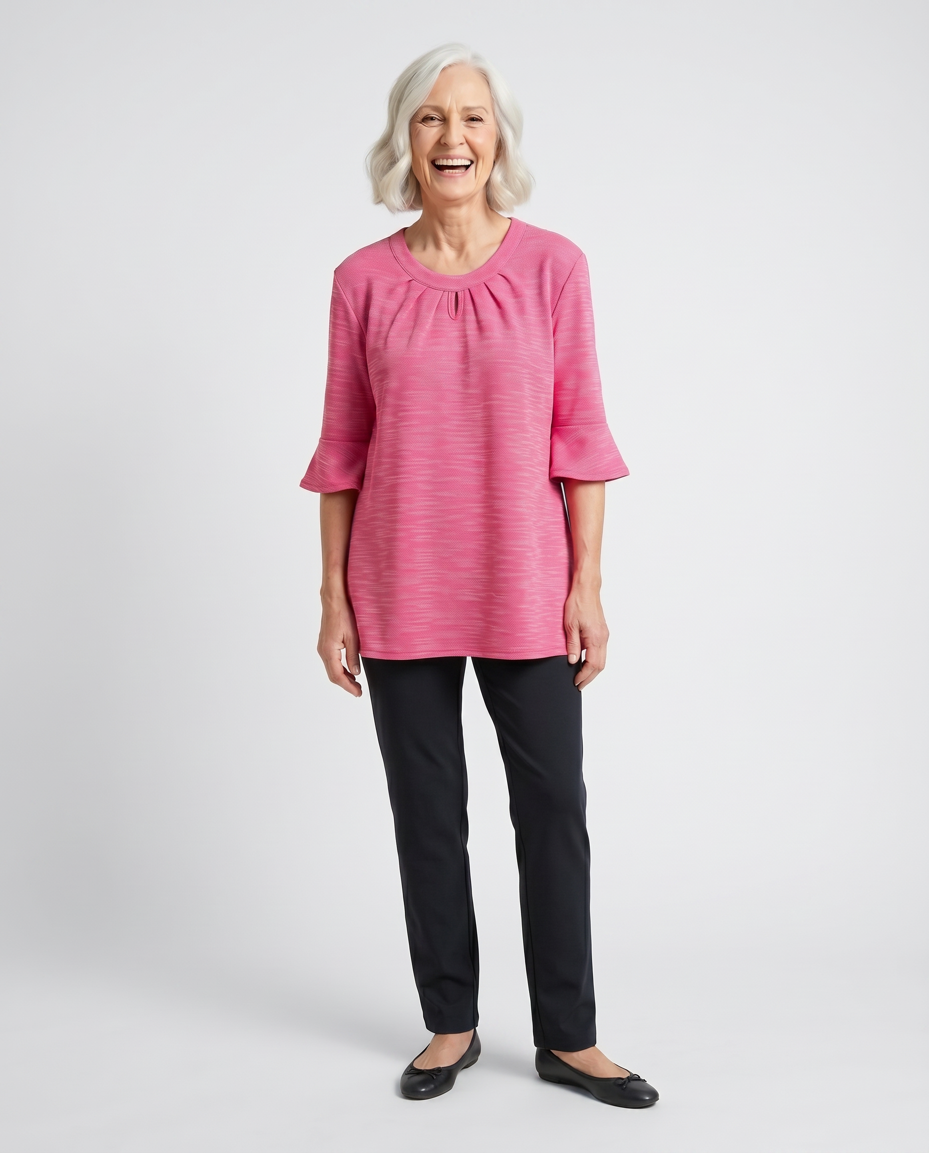 Senior woman wearing Ovidis adaptive orchid top with bell sleeves and keyhole neckline, easy dressing