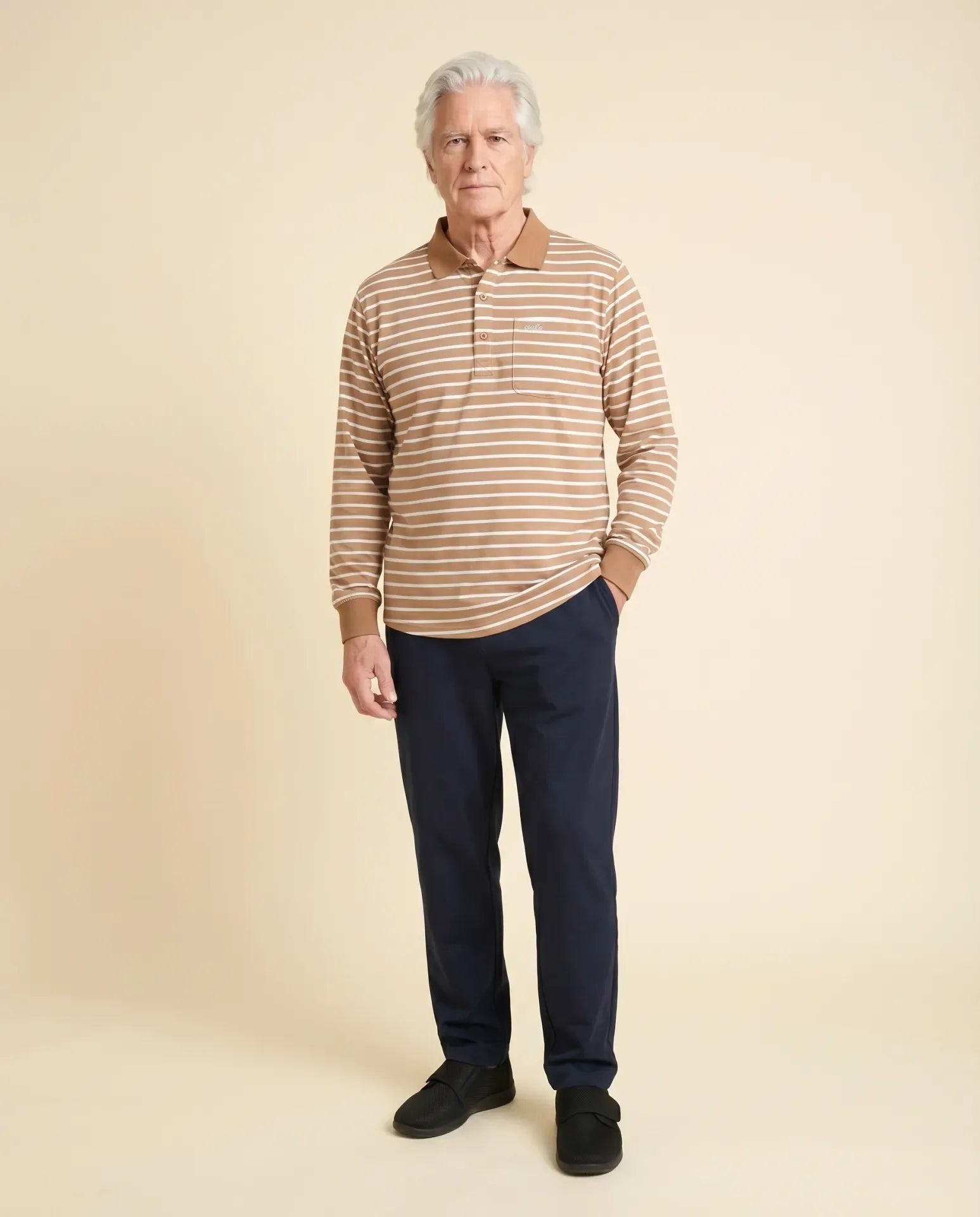 Senior man wearing Ovidis adaptive brown striped long-sleeve Lucas polo