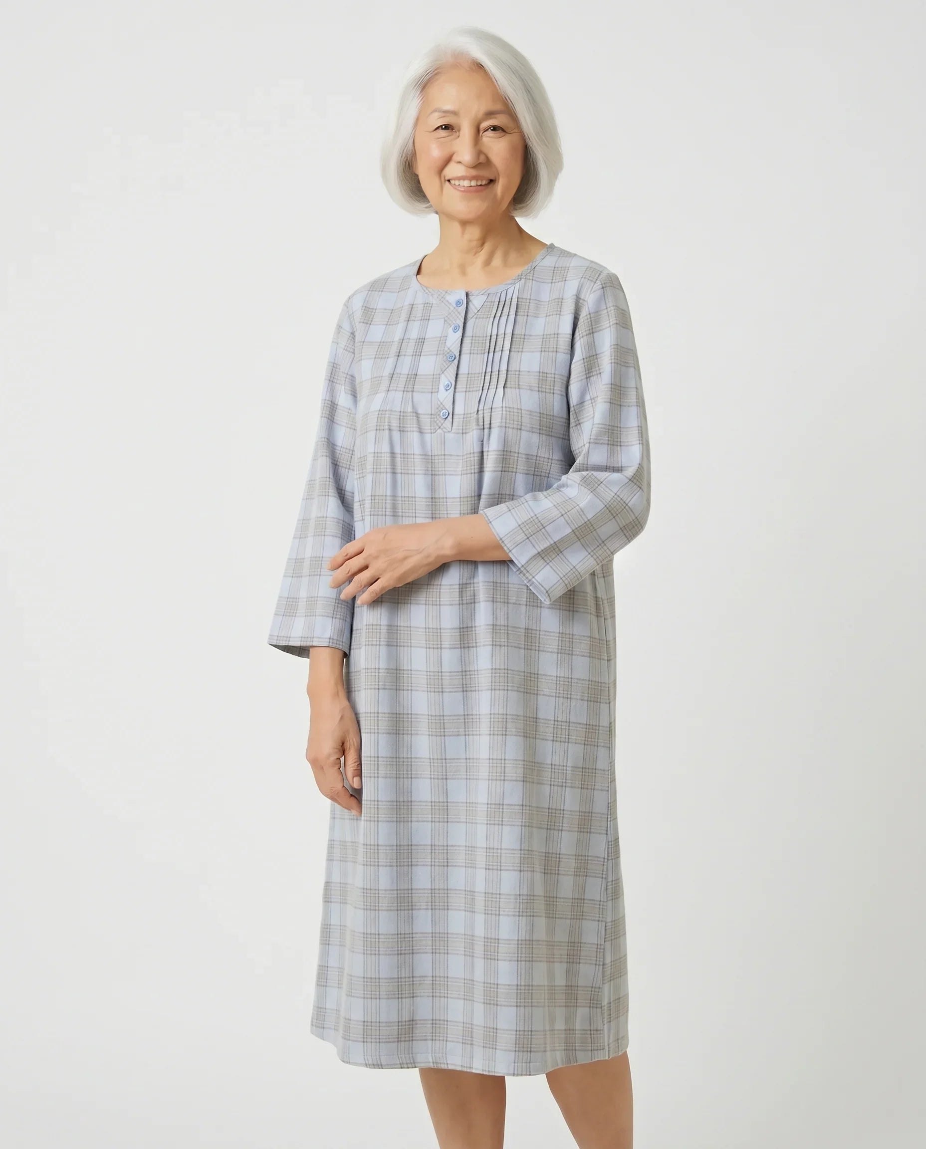 Senior woman wearing Elsa Nightgown in Blue plaid, front view