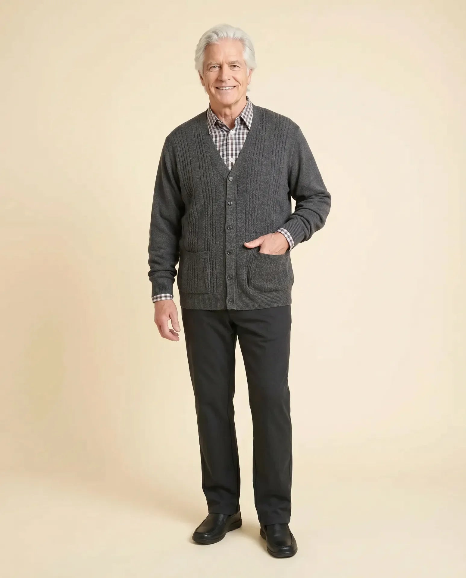 Senior man wearing Ovidis Heritage Cardigan in heathered charcoal grey