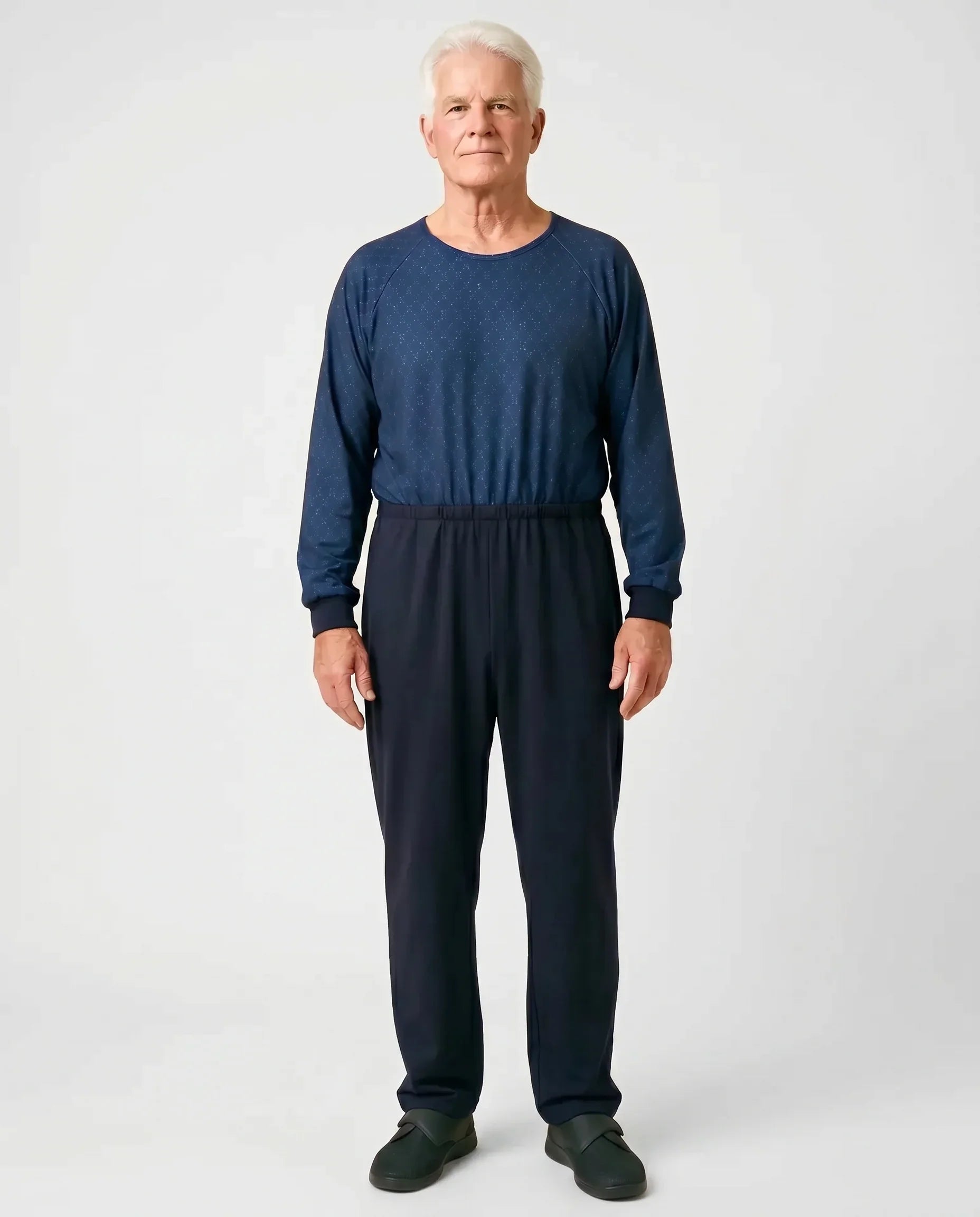 Man wearing Henry Jumpsuit Starlight - adaptive anti-strip one-piece jumpsuit with long sleeves and constellation dot print top