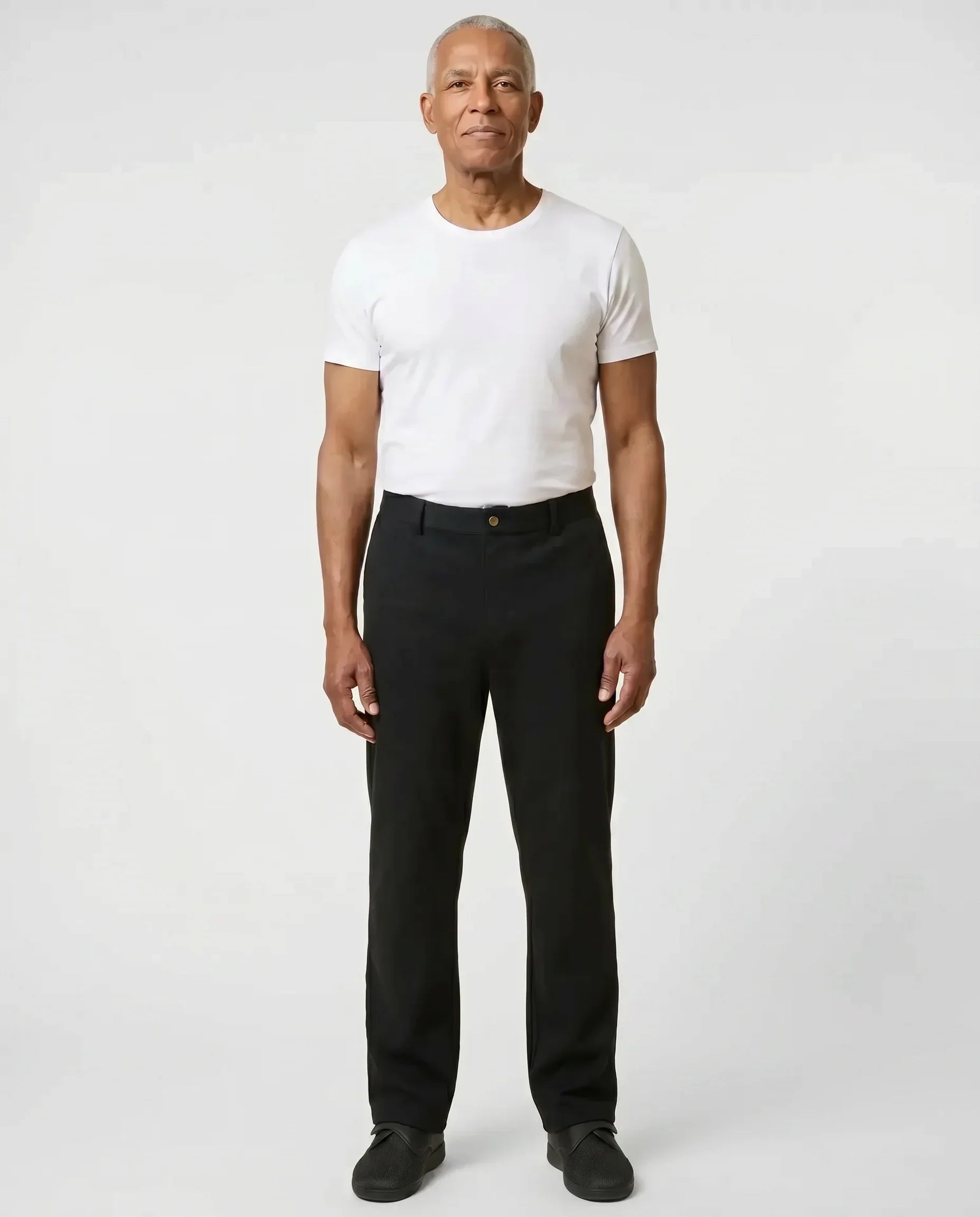 Senior man wearing Ovidis Jack Pants in Black, full body front view