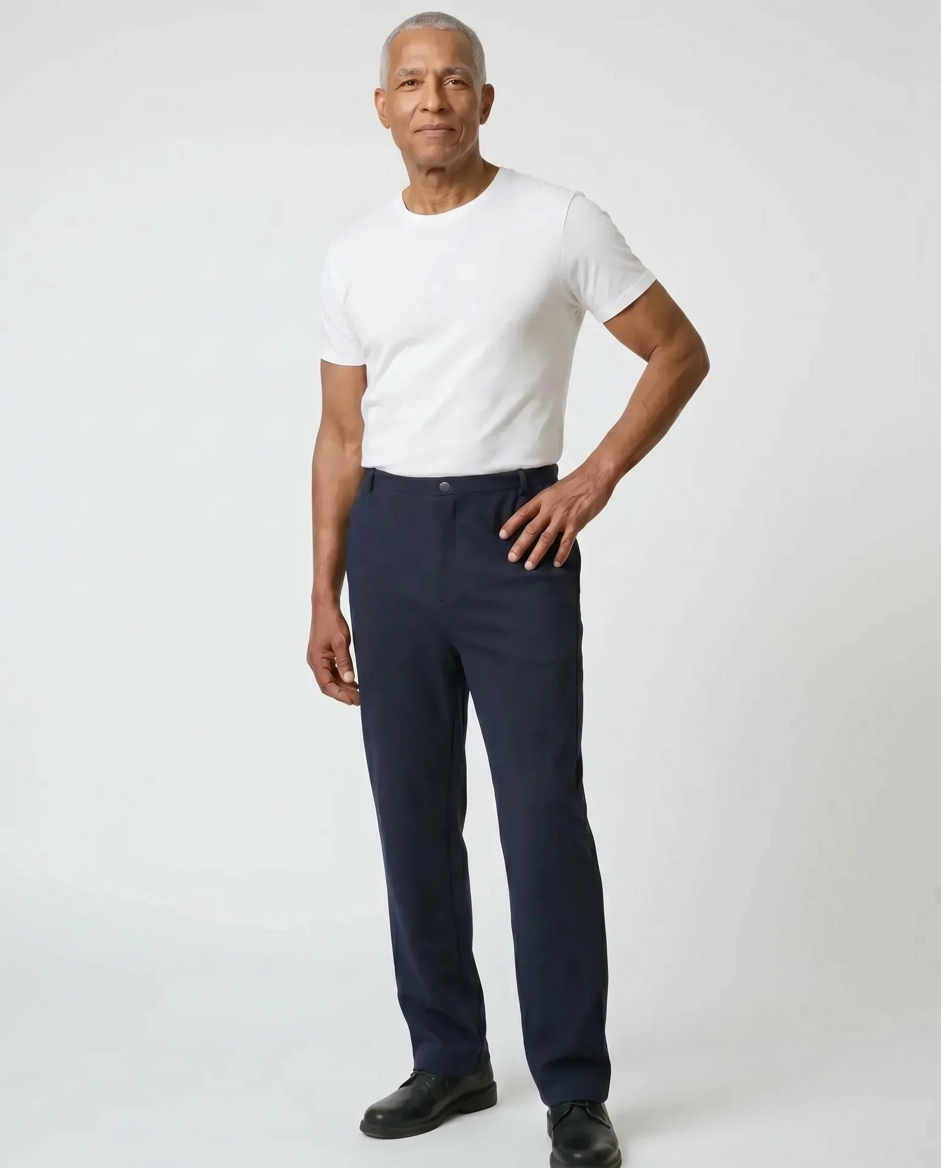 Senior man wearing Ovidis Jack Pants in Navy, full body front view