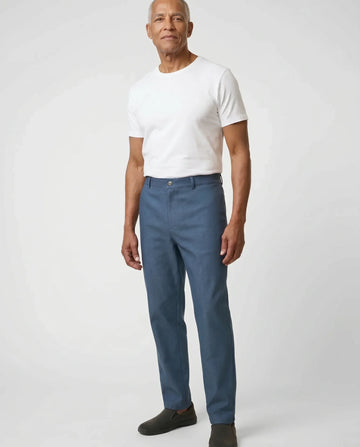 Senior man wearing Ovidis Liam Jeans in Blue, full body front view