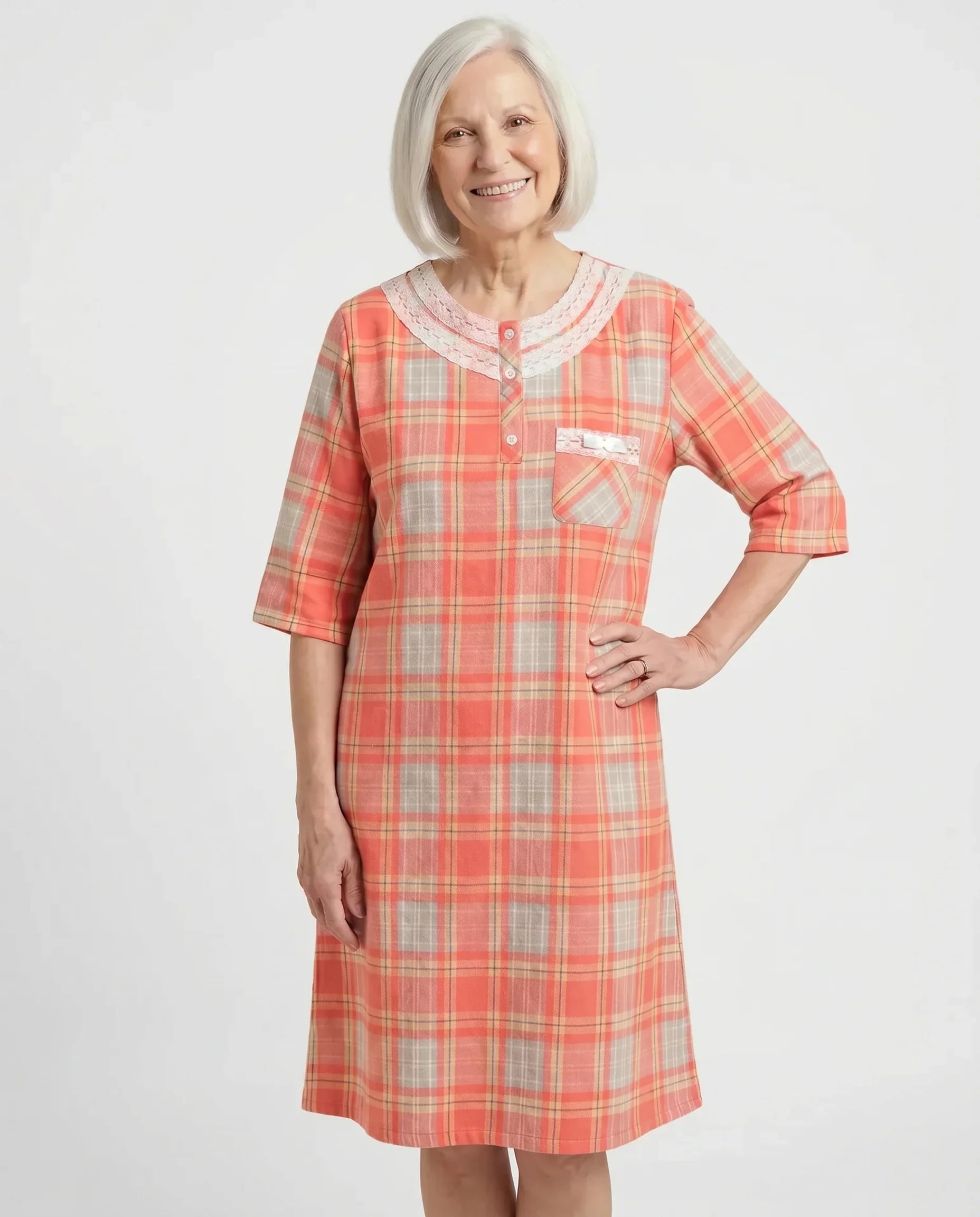 Senior woman wearing Mandy Nightgown in Coral plaid, front view