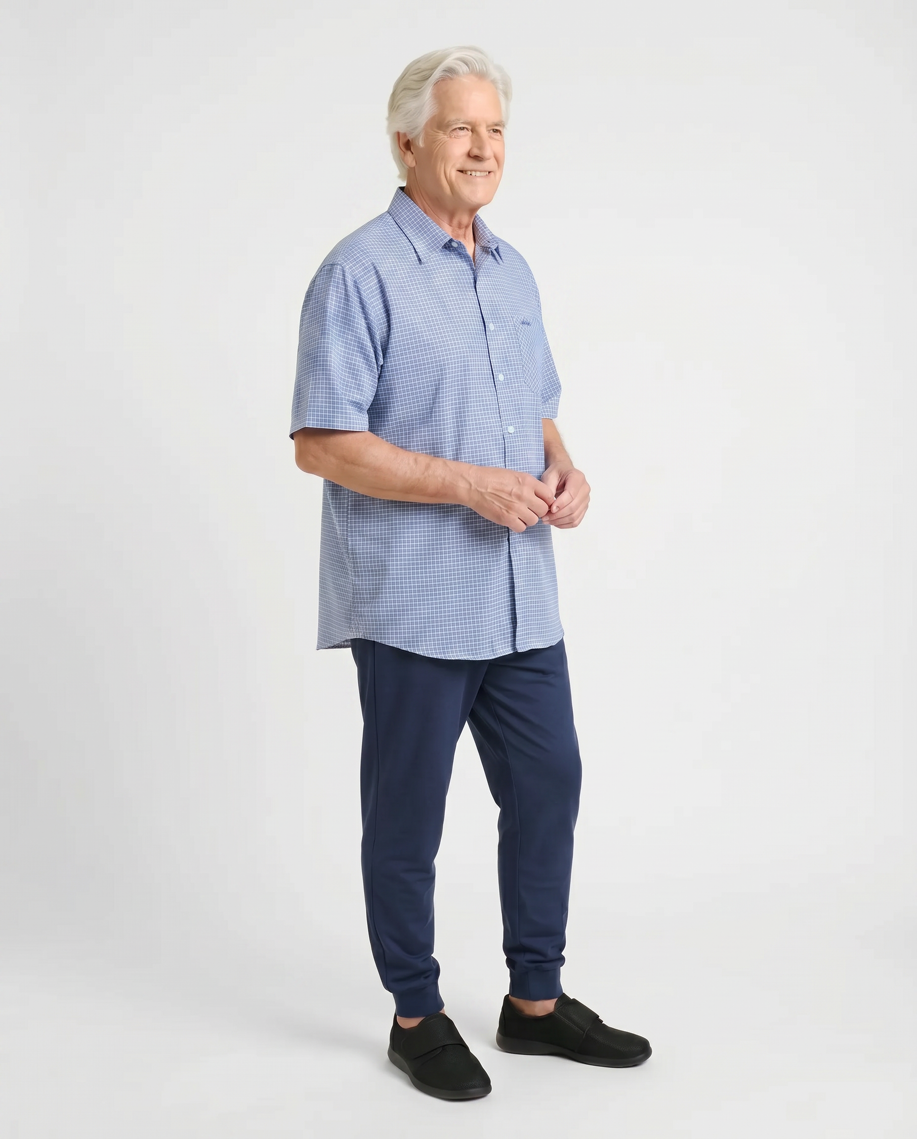 Senior man wearing Ovidis adaptive Paolo Blue check short sleeve shirt, easy assisted dressing for seniors
