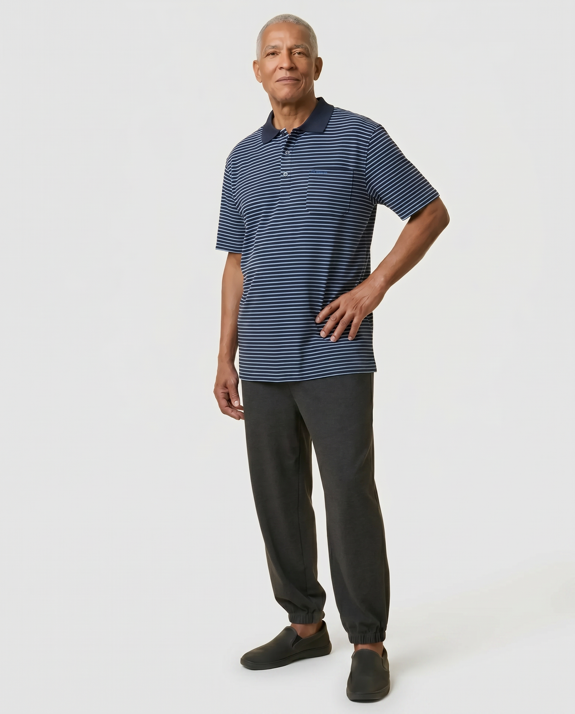 Senior man wearing Ovidis adaptive navy blue stripes polo shirt