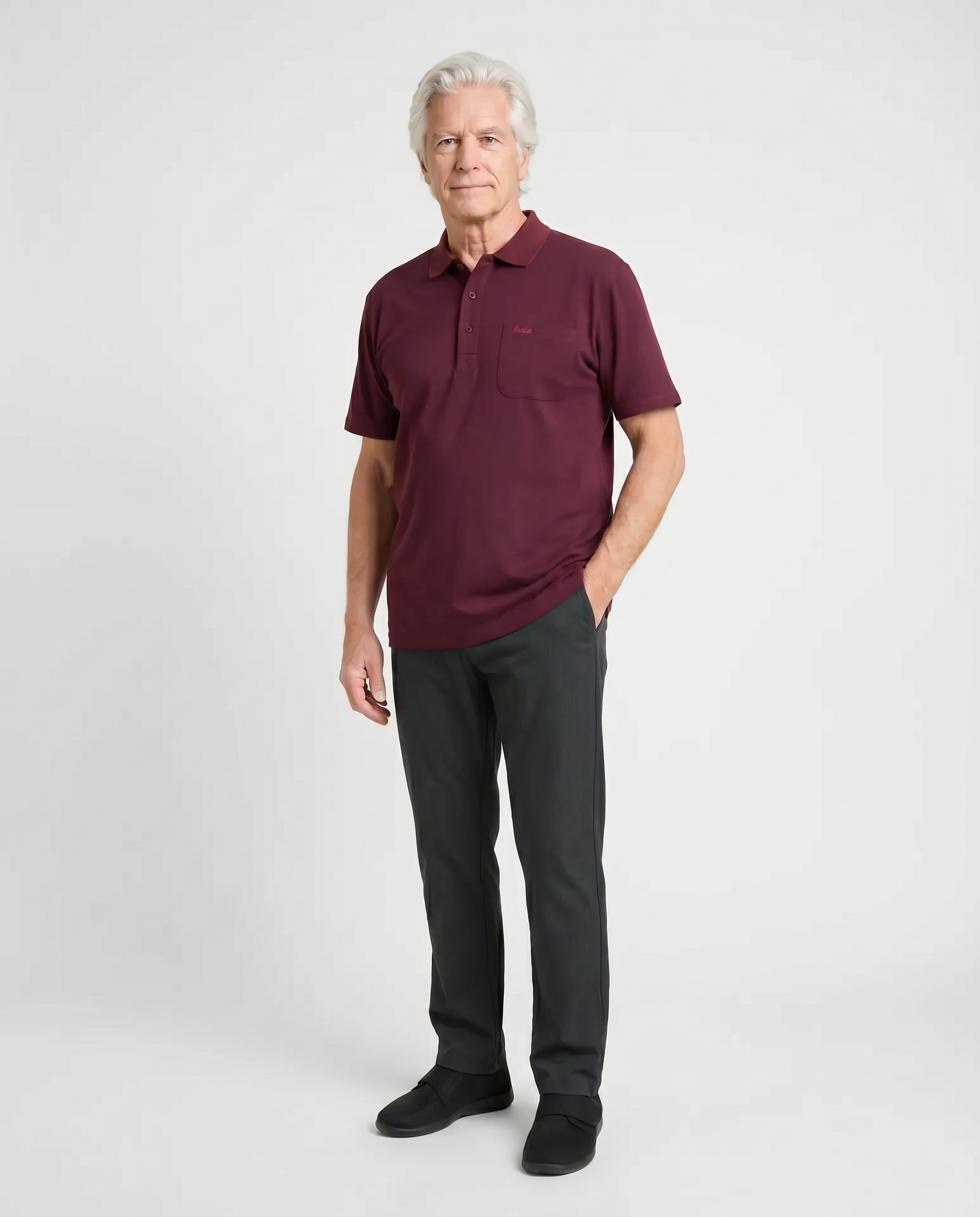 Senior man wearing Ovidis adaptive Ralfie Burgundy polo shirt, easy assisted dressing for seniors