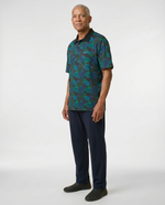 Senior man wearing Ovidis adaptive tropical print polo shirt