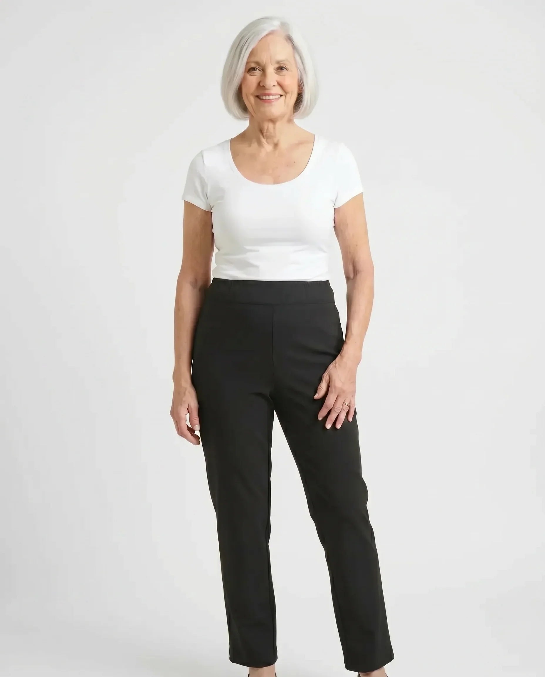 Senior woman wearing Ovidis Sara Pants in Black, full body front view
