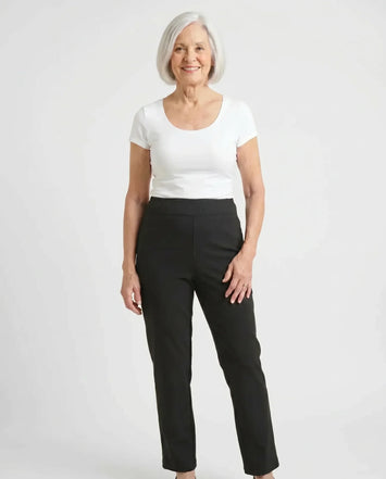 Senior woman wearing Ovidis Sara Pants in Black, full body front view