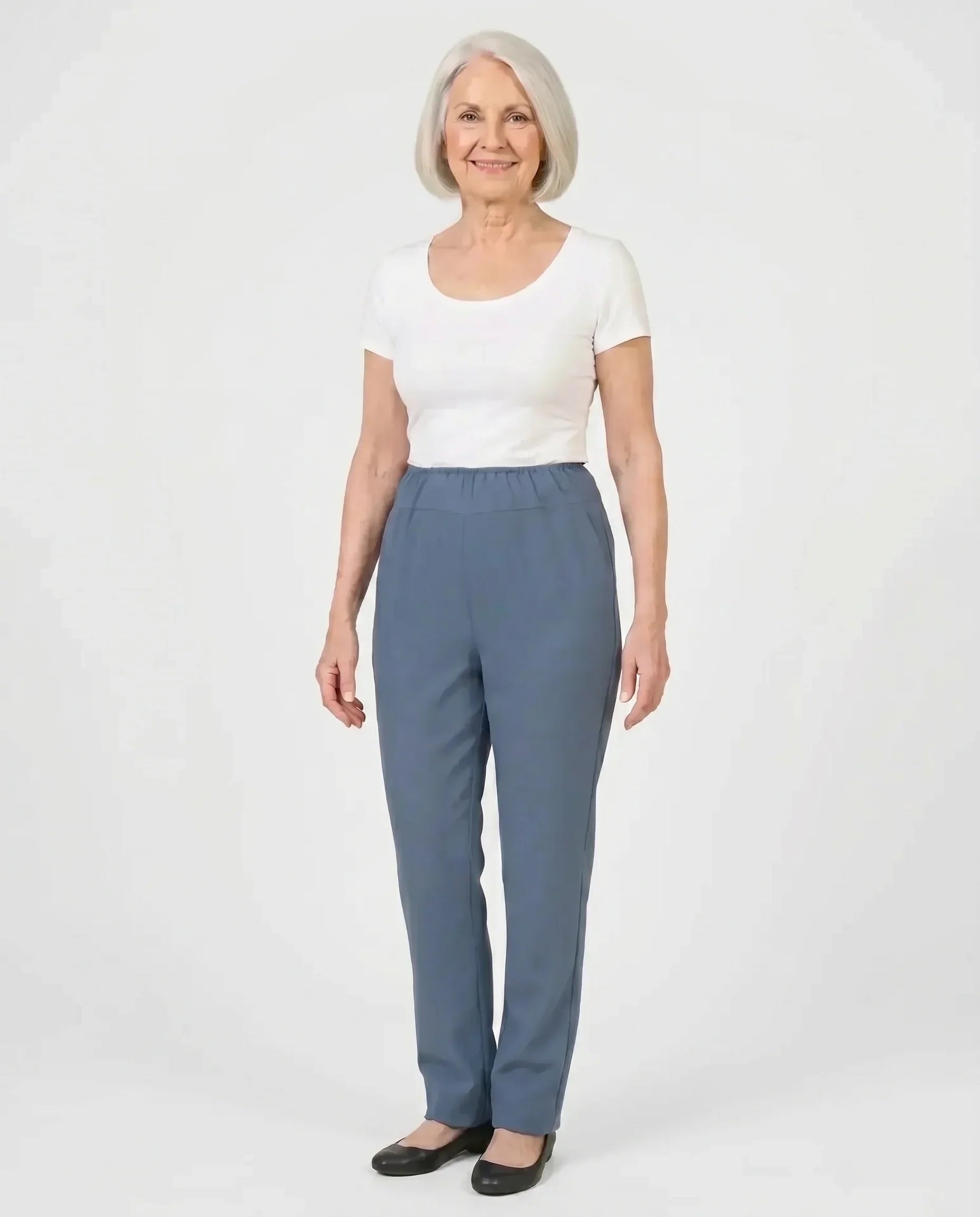 Senior woman wearing Ovidis Sara Pants in Blue, full body front view