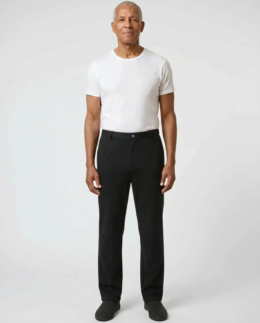Senior man wearing Ovidis Stan Pants in Black, full body front view