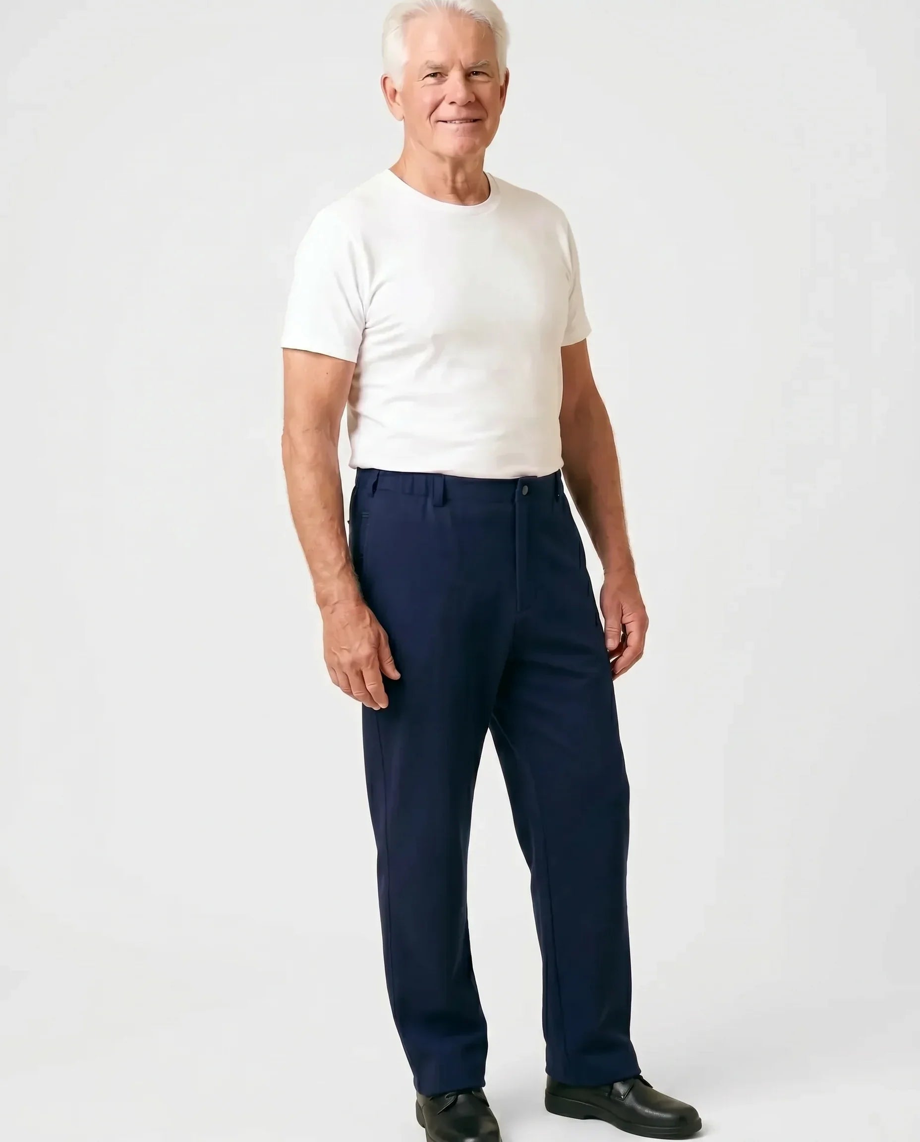 Senior man wearing Ovidis Stan Pants in Navy, full body front view