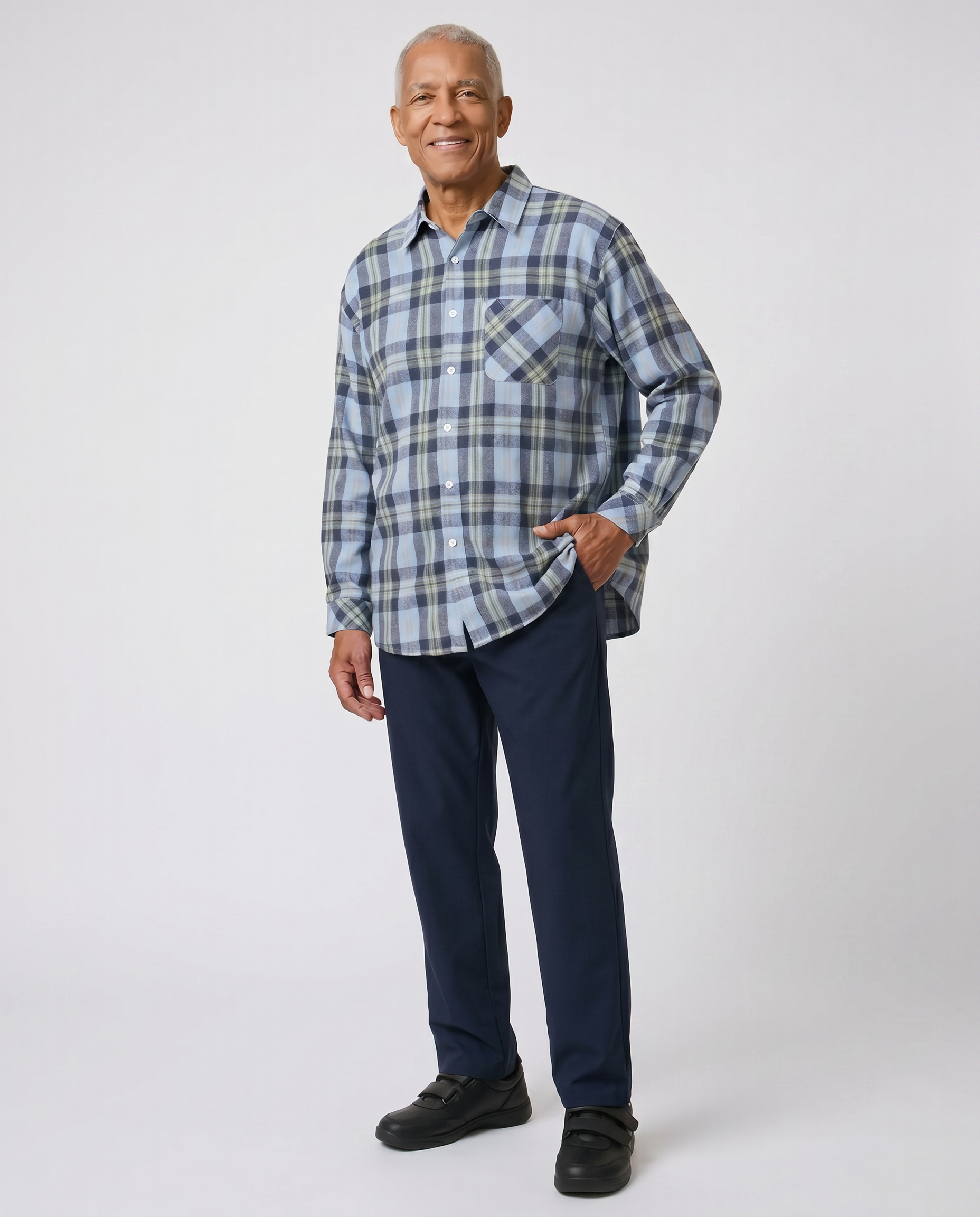 Senior man wearing Ovidis adaptive Theo Sky Blue plaid flannel shirt, easy assisted dressing for seniors