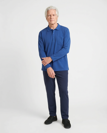 Senior man wearing Ovidis adaptive Thomas Blue cobalt polo shirt, easy assisted dressing for seniors