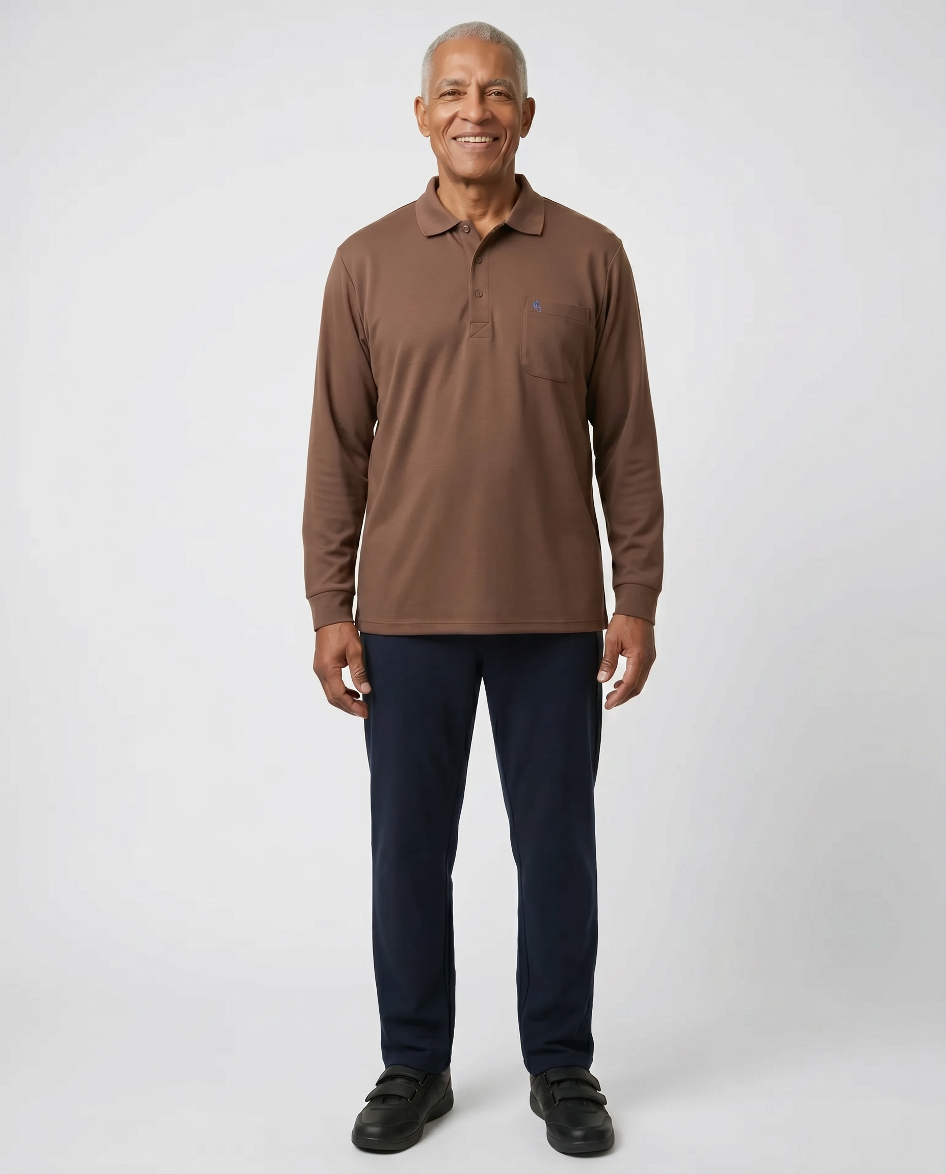 Senior man wearing Ovidis adaptive Thomas Coffee polo shirt, easy assisted dressing for seniors