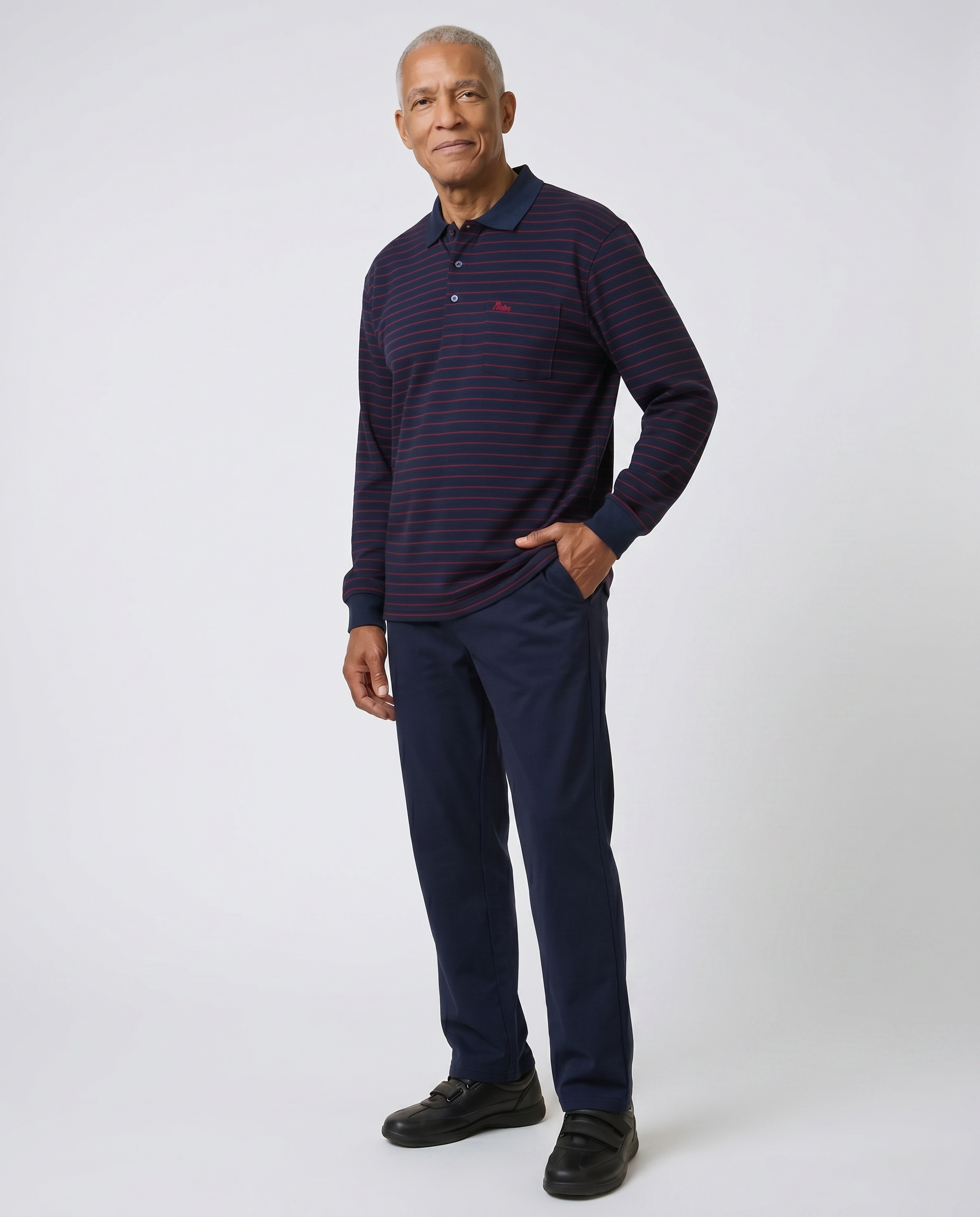 Senior man wearing Ovidis adaptive Thomas Midnight navy stripe polo shirt, easy assisted dressing for seniors