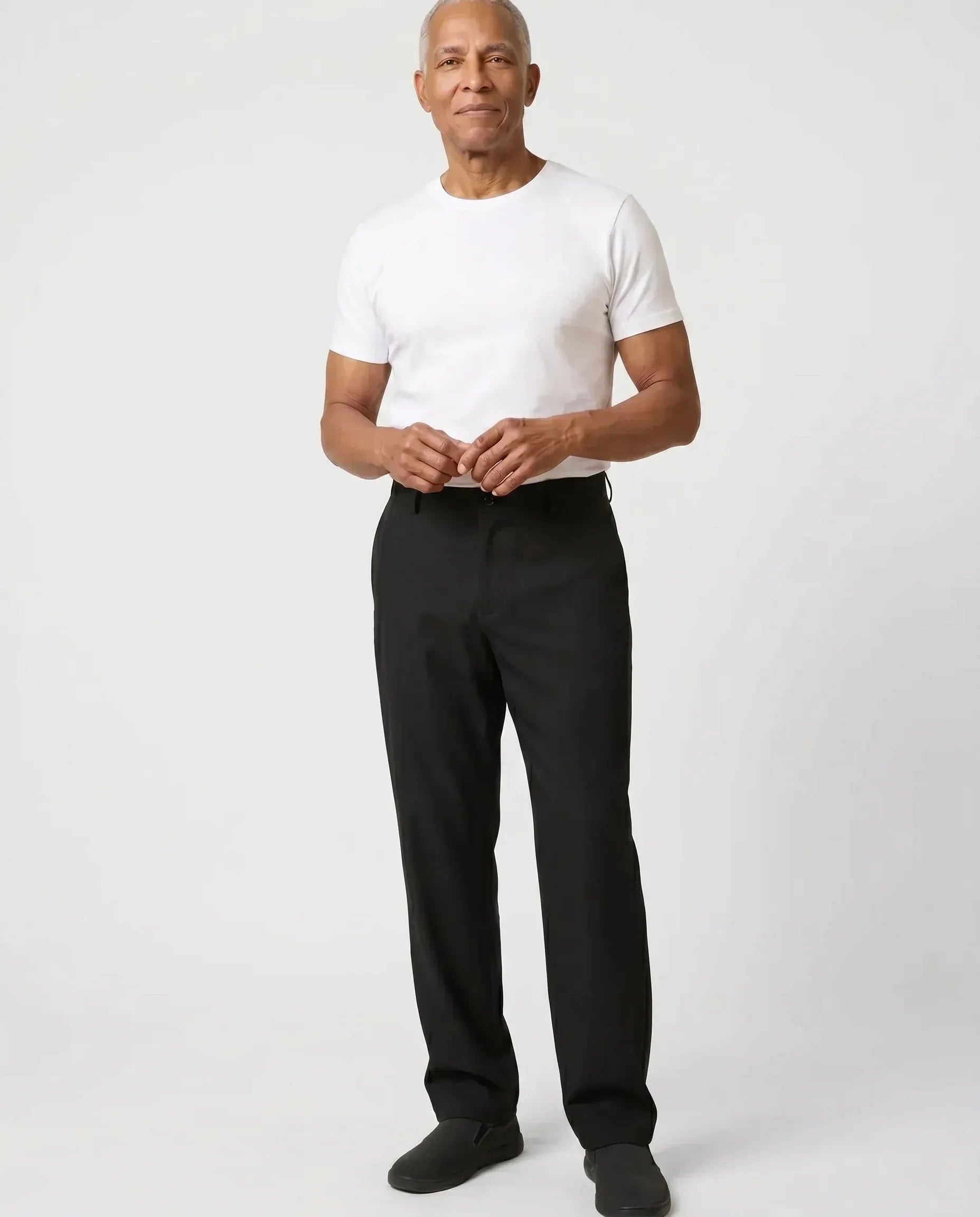 Senior man wearing Ovidis Timmy Pants in Black, full body front view