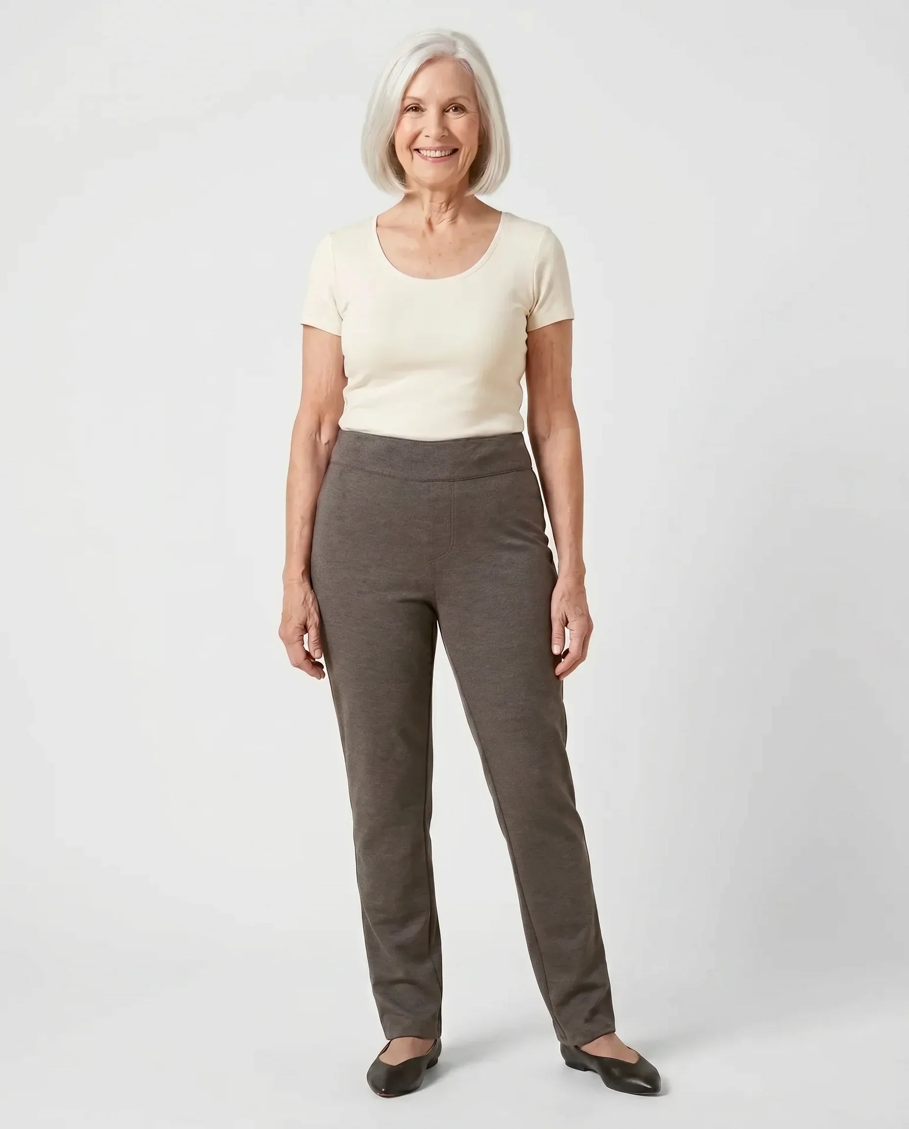 Senior woman wearing Ovidis Tricotti Pants in Charcoal, full body front view
