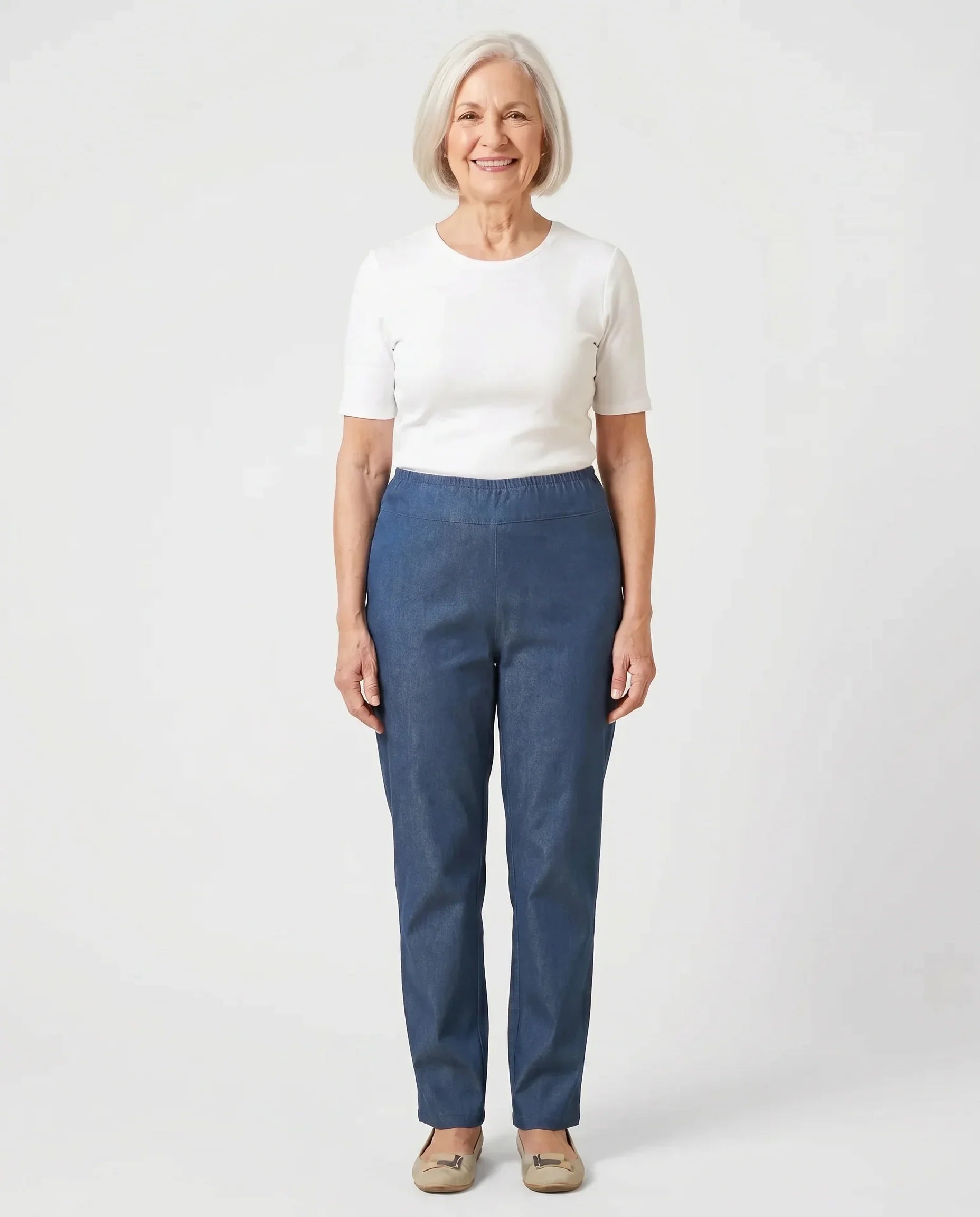 Senior woman wearing Ovidis Tricotti Jeans in Denim, full body front view