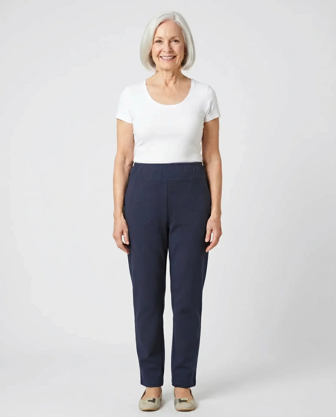 Senior woman wearing Ovidis Tricotti Pants in Navy, full body front view