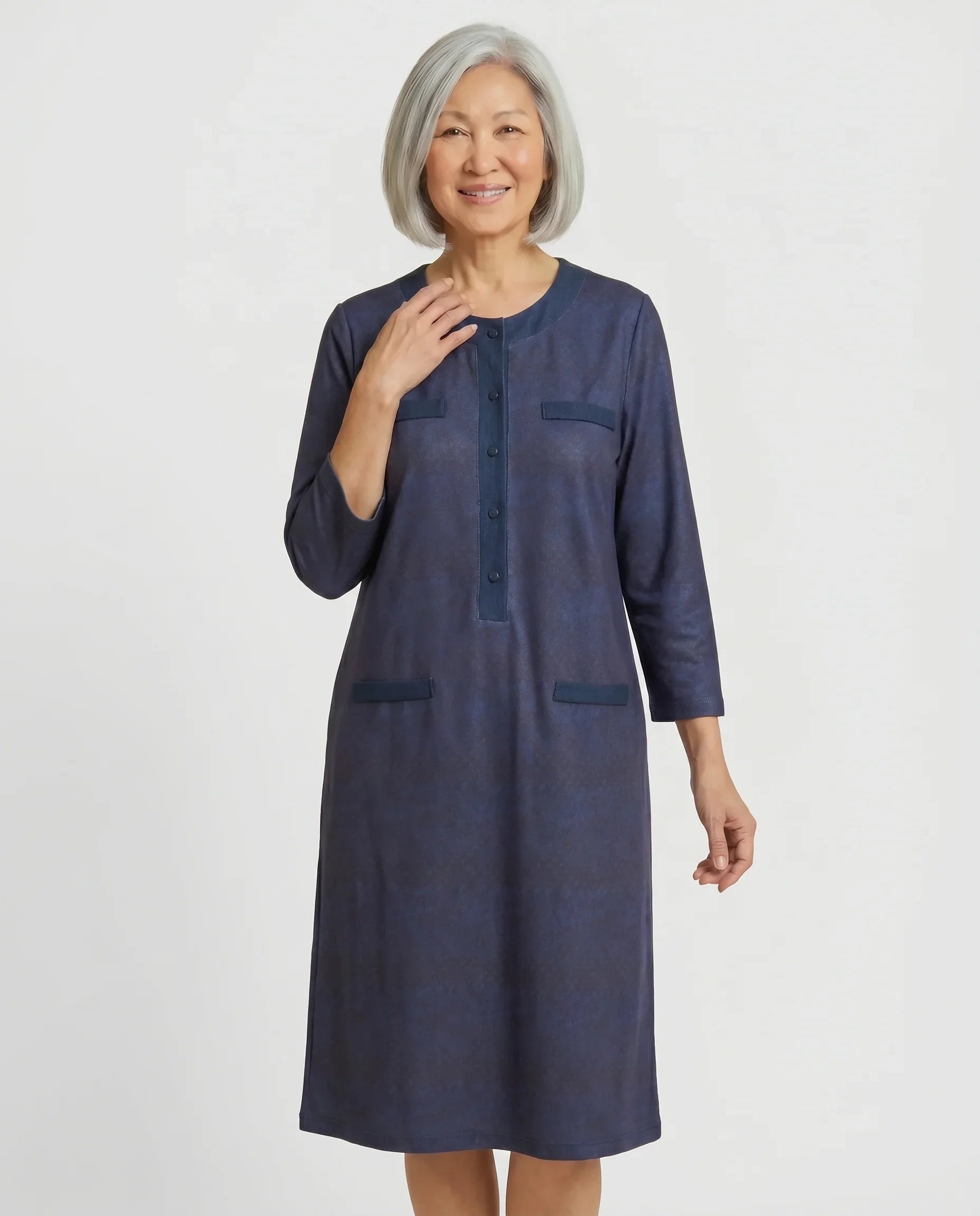 Senior woman wearing Vera Moonlight adaptive navy dress with denim trim, front view